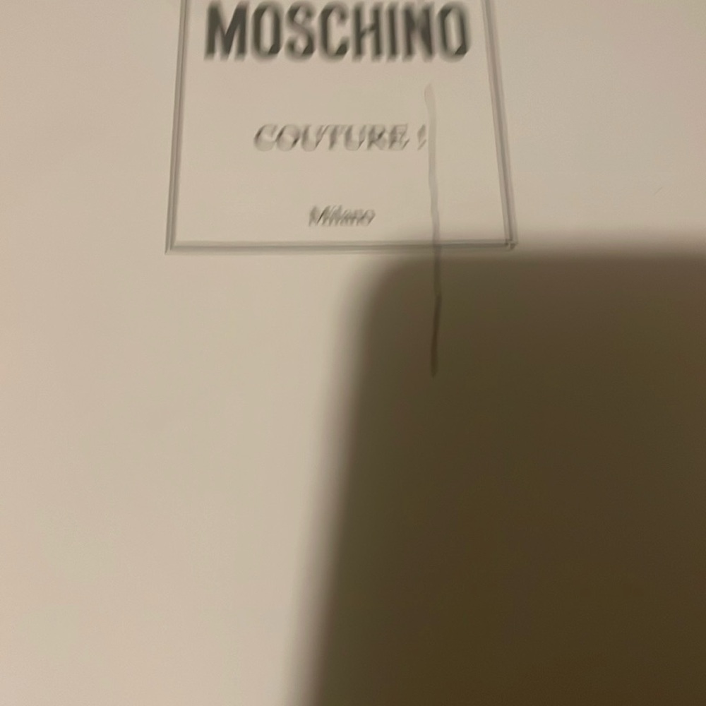 Moschino brand new embossed leather sneakers.